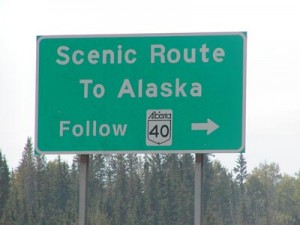 Road sign that says "Scenic Route to Alaska"